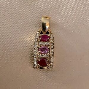 Elegant 14kt Gold and Red Gemstone Pendant Encrusted in Diamonds